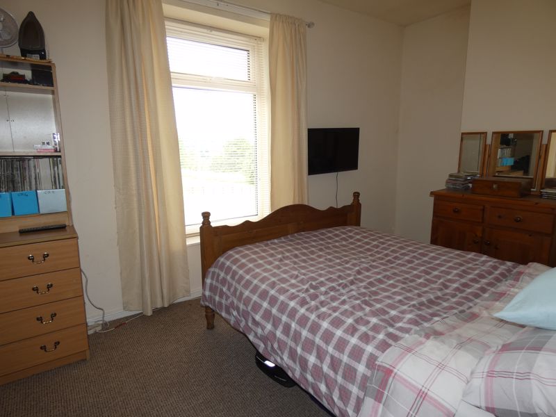 Bedroom One- click for photo gallery